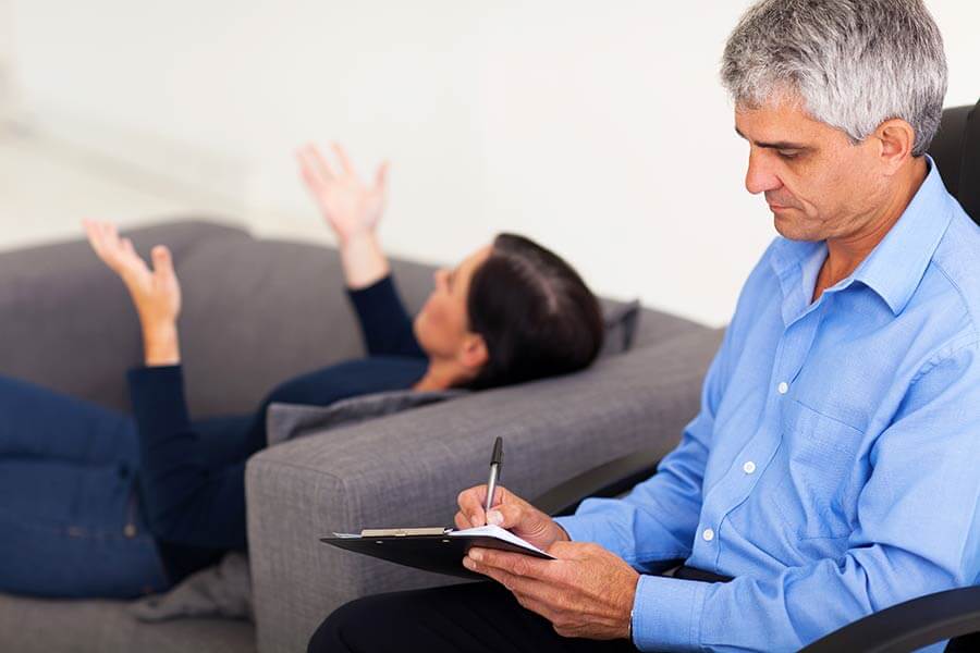 Therapist Leading Cognitive Behavioral Therapy Session