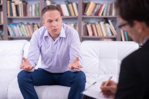a man participates in addiction treatment for attorneys