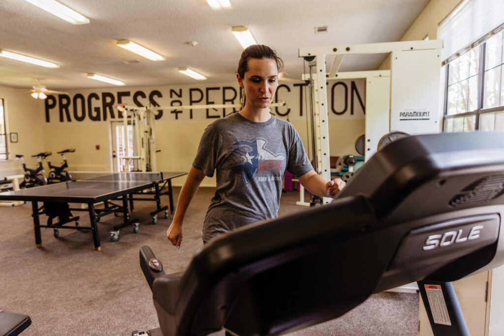 Client on treadmill in Work out room at Santé Center for Healing