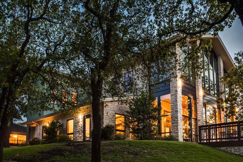 Santé Center for Healing facility at dusk