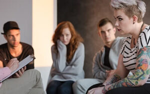 Group of people administering addiction intervention strategies