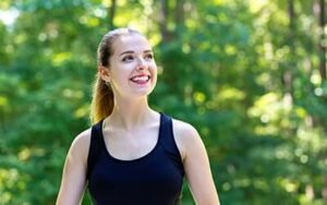 Woman enjoys time outdoors at her private rehab center