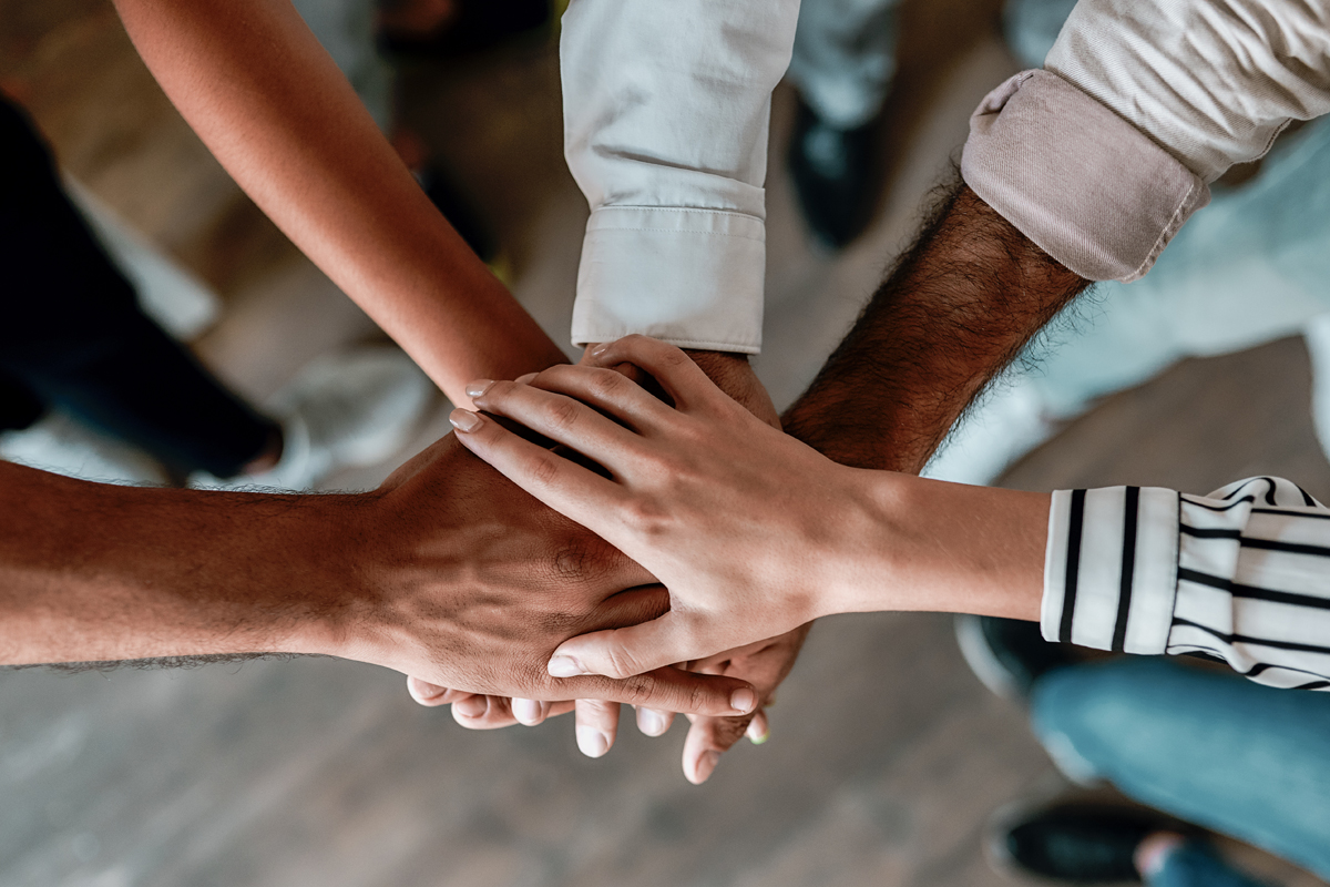 Hands together in support