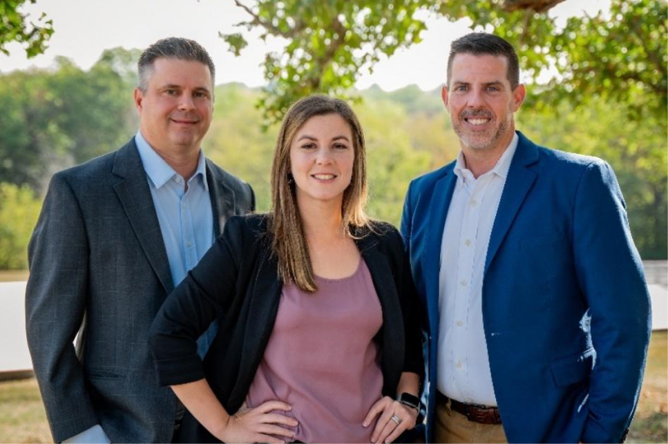 Keith Klein, Michelle Luttrell, and Sam Slaton standing together outside