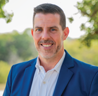 325×318-headshot-Sam-S-2024-new headshot of sam slaton